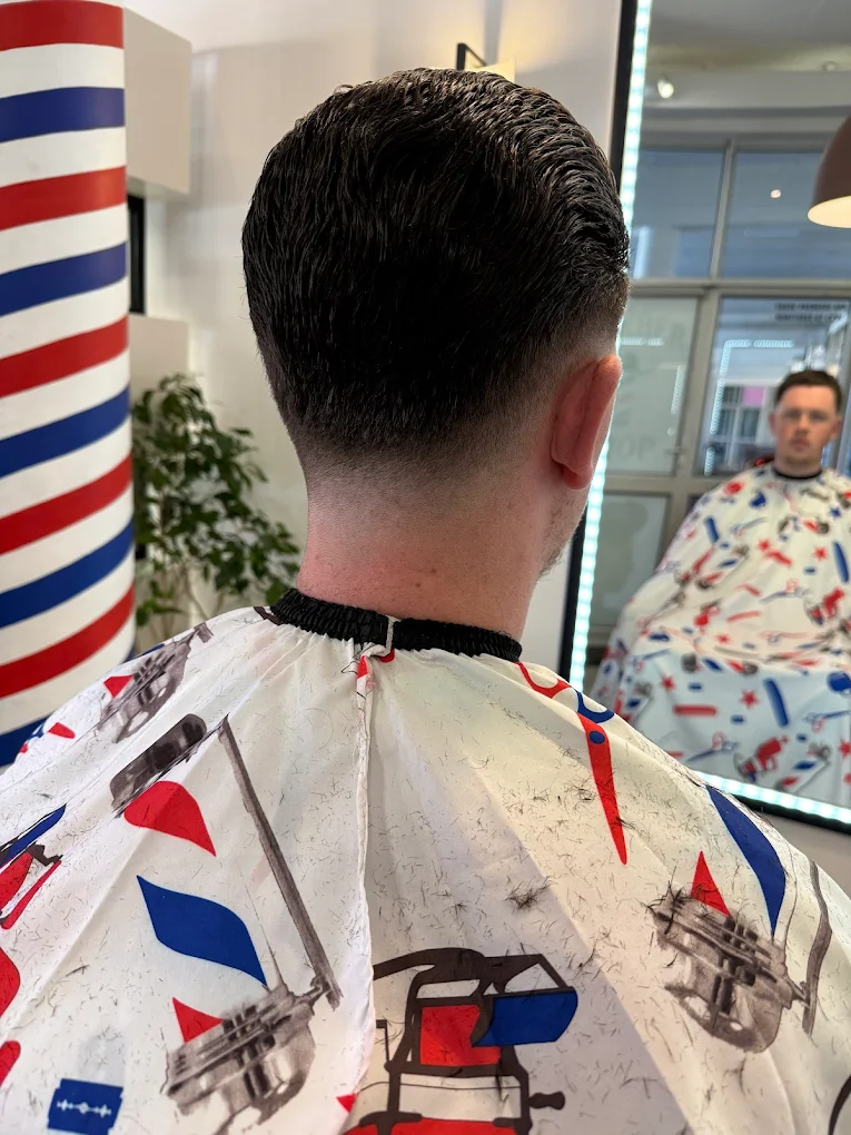 Clean taper fade haircut from the back